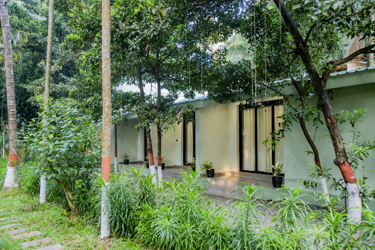 Cottage 2 (Room 102) — Lush Tropical Greenery & Garden Courtyard