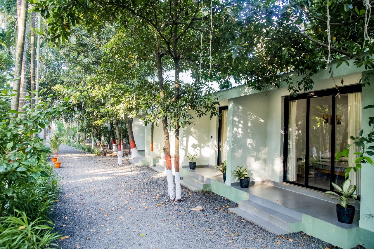 Cottage 2 (Room 102) — Verandah Seating with Garden View