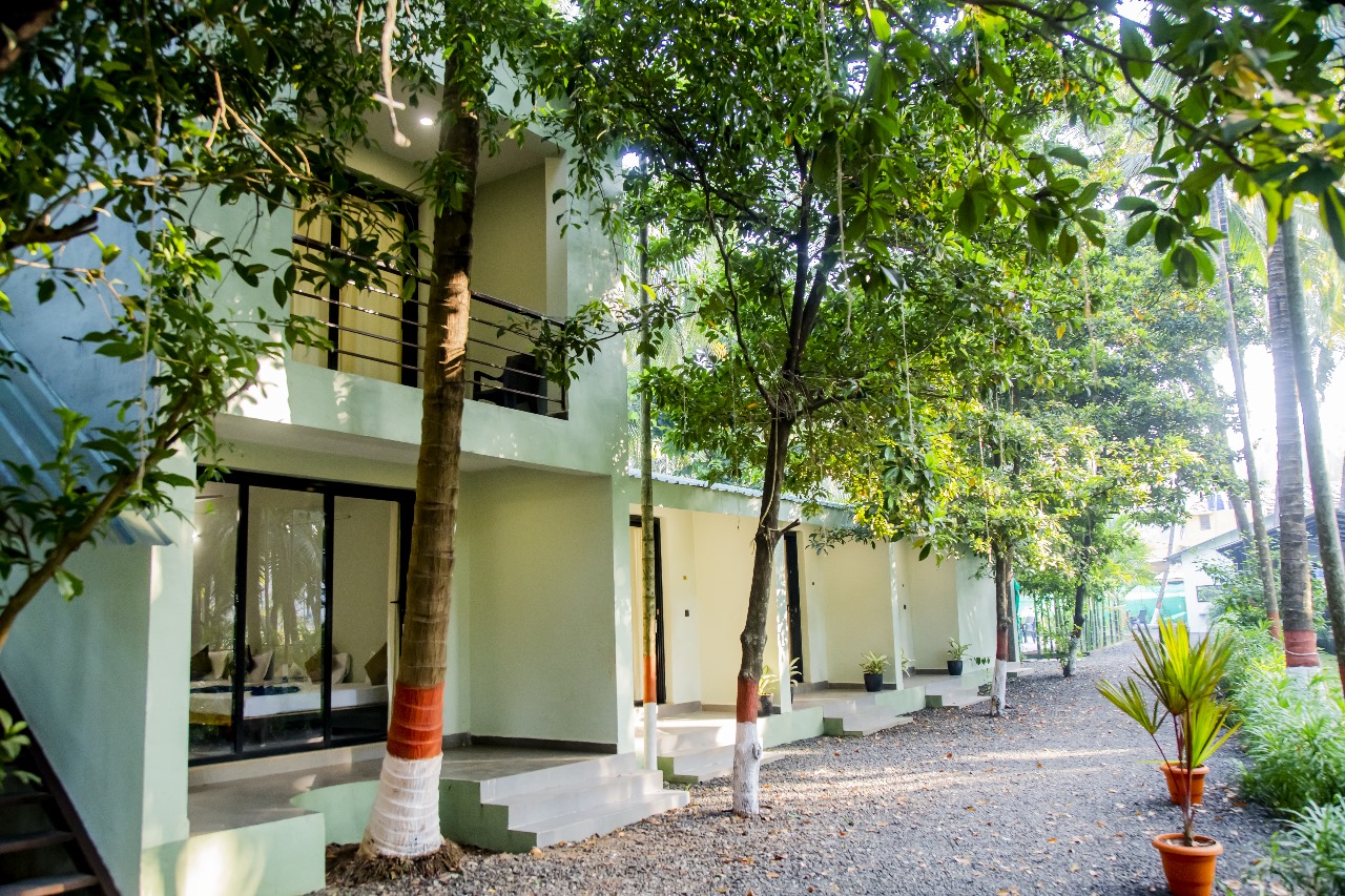 Cottage 2 (Room 102) — Shaded Stone Walkway to Cottage Entrance